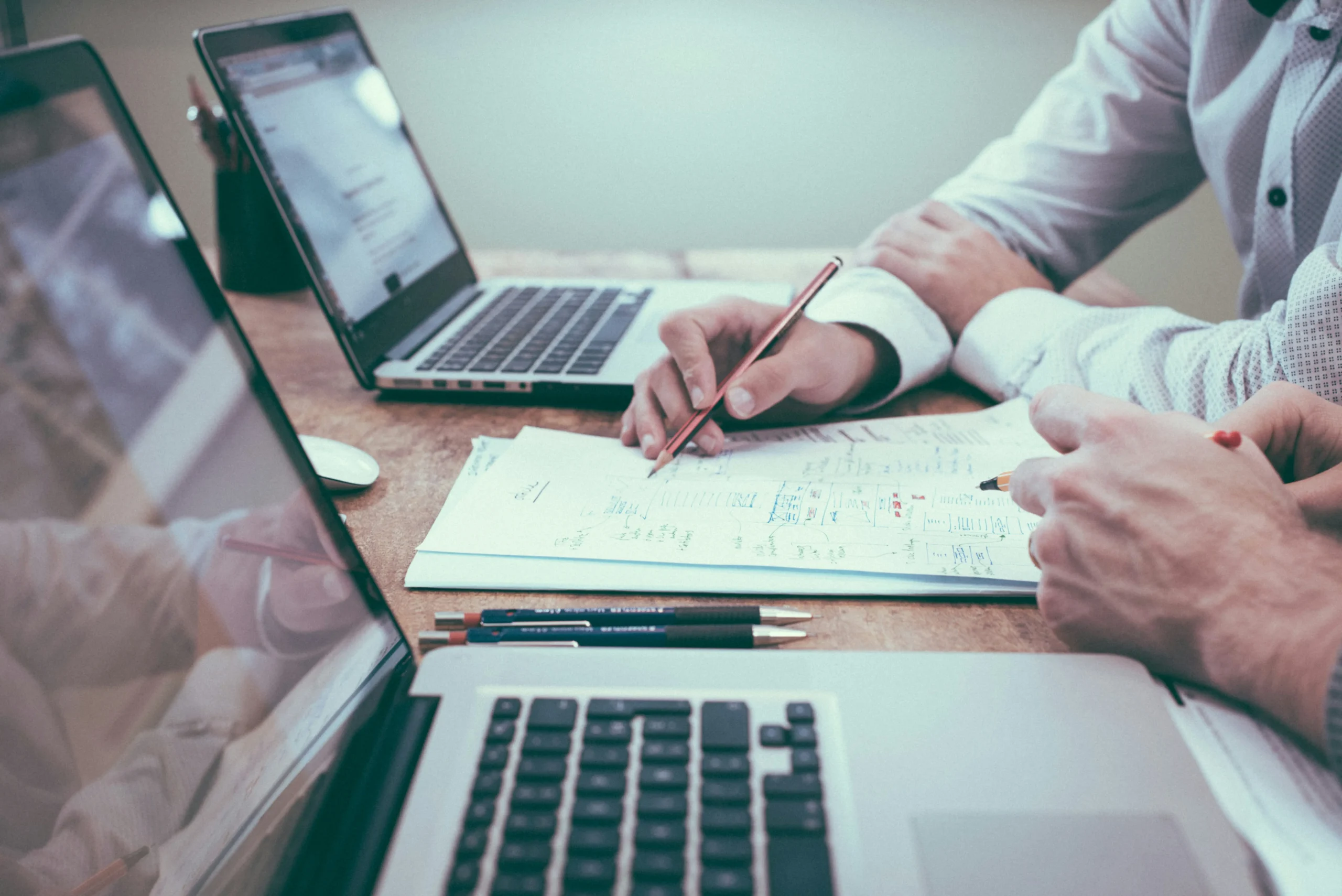 SME owner reviewing cash flow forecast